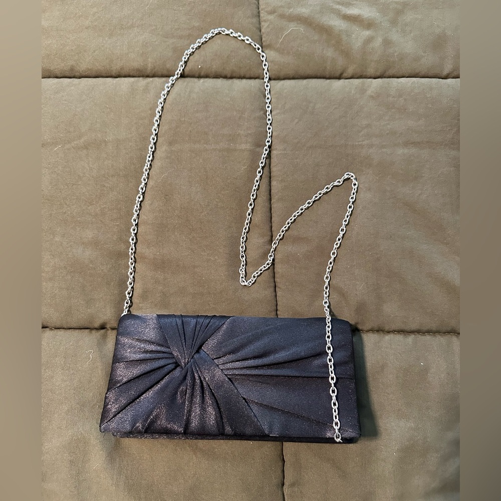 Charming Charlie’s Black and Silver clutch